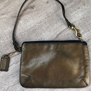 Fun, gold distressed leather Coach wristlet